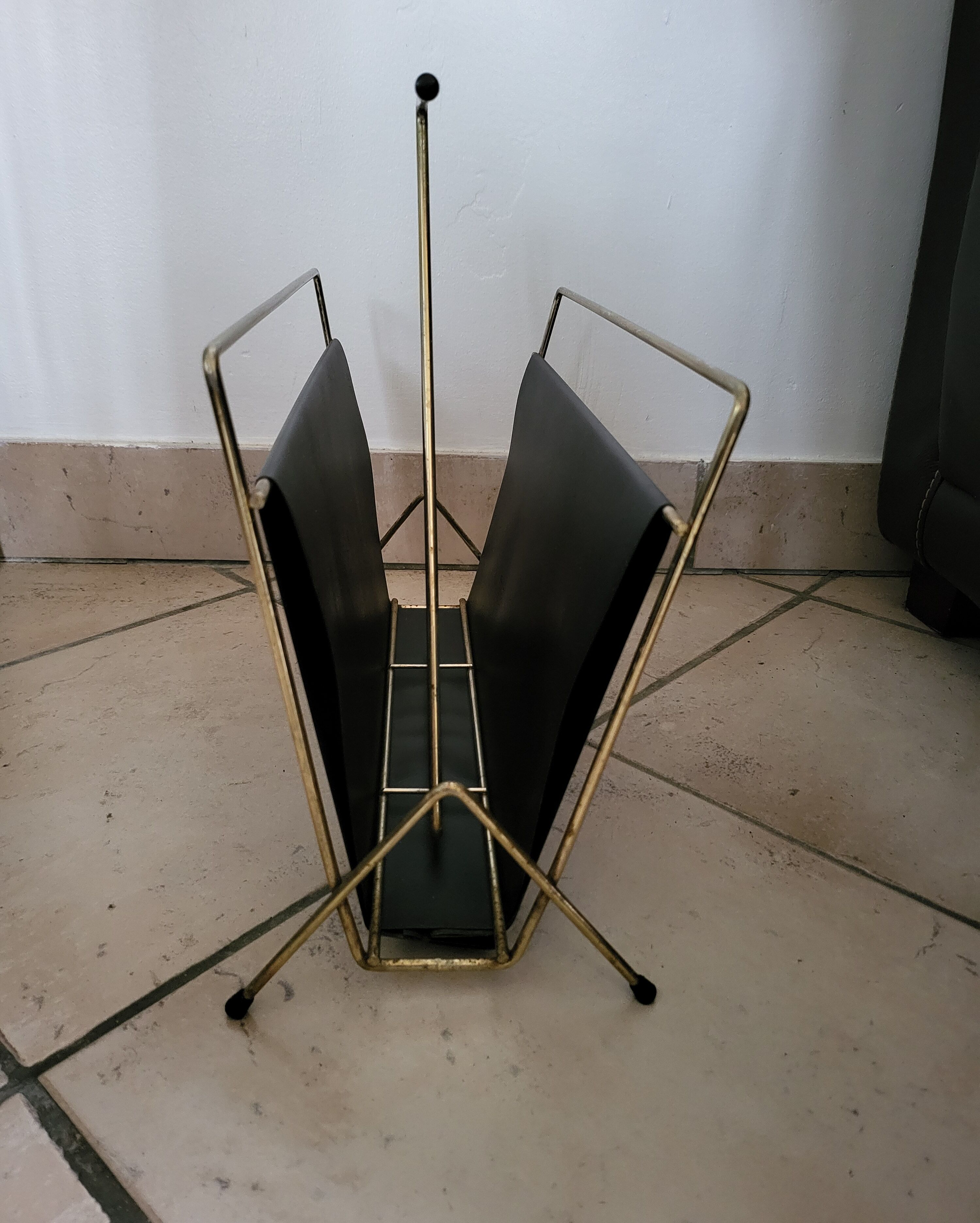 Vintage metal magazine rack in gold and black vinyl Newspaper holder