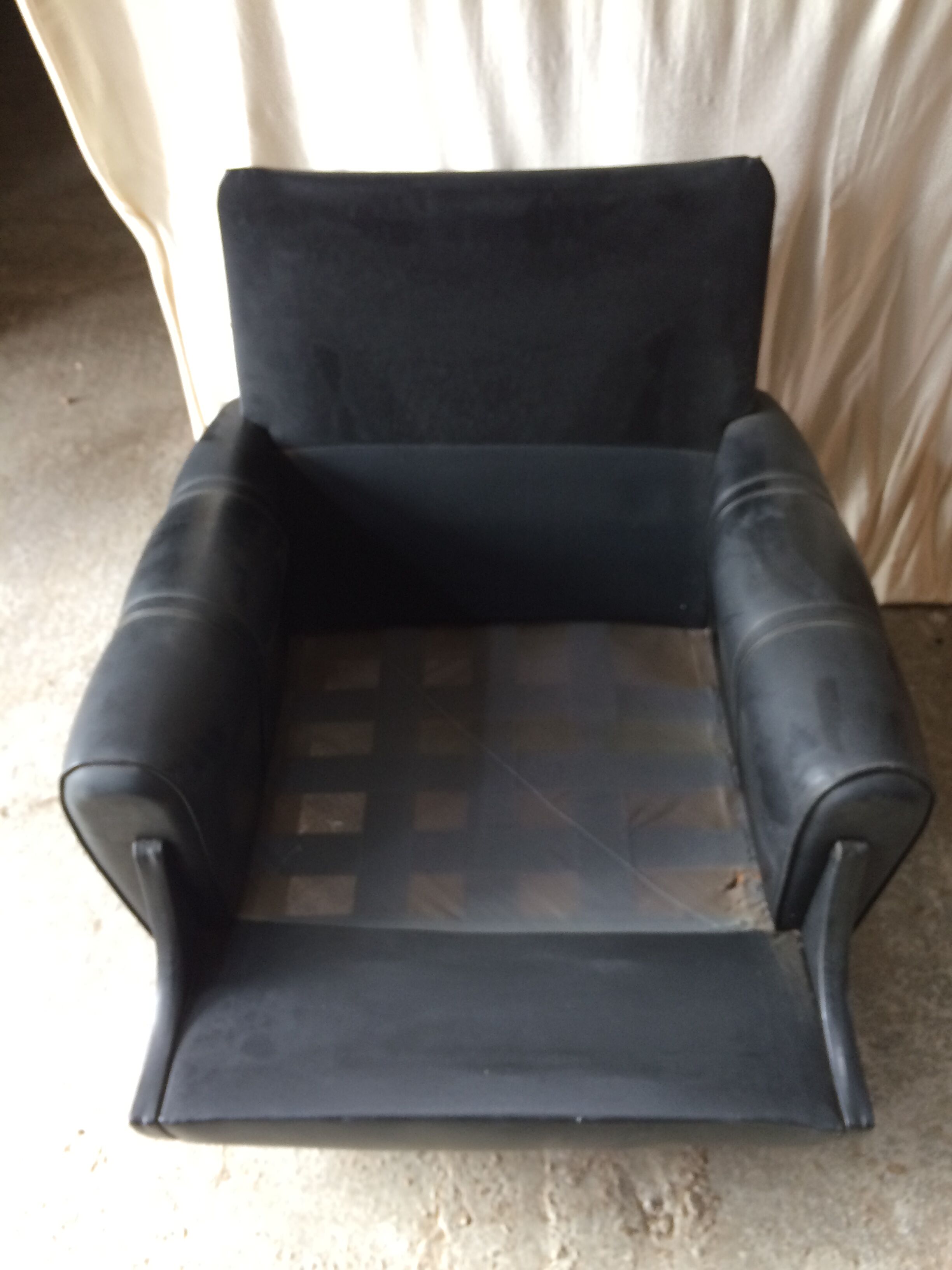Former black leather chair