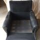 Former black leather chair