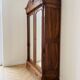 Antique walnut wardrobe with bevelled mirrors.