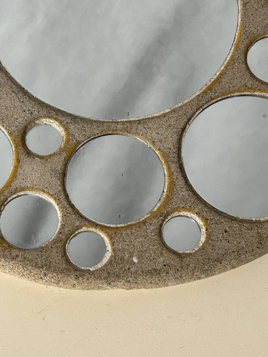 Round ceramic mirror