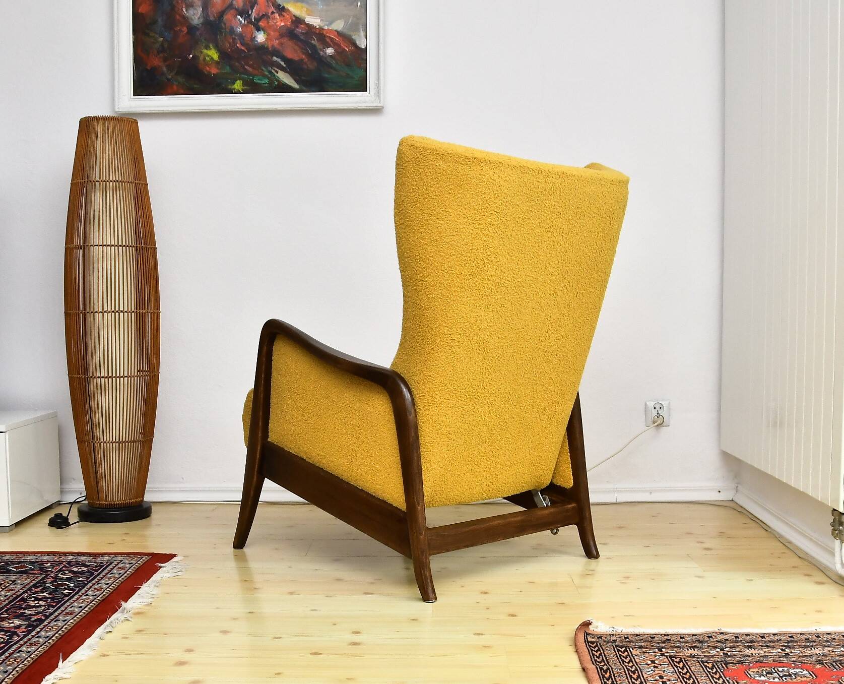 Yellow boucle wingback chair with folding footstool, 1950s