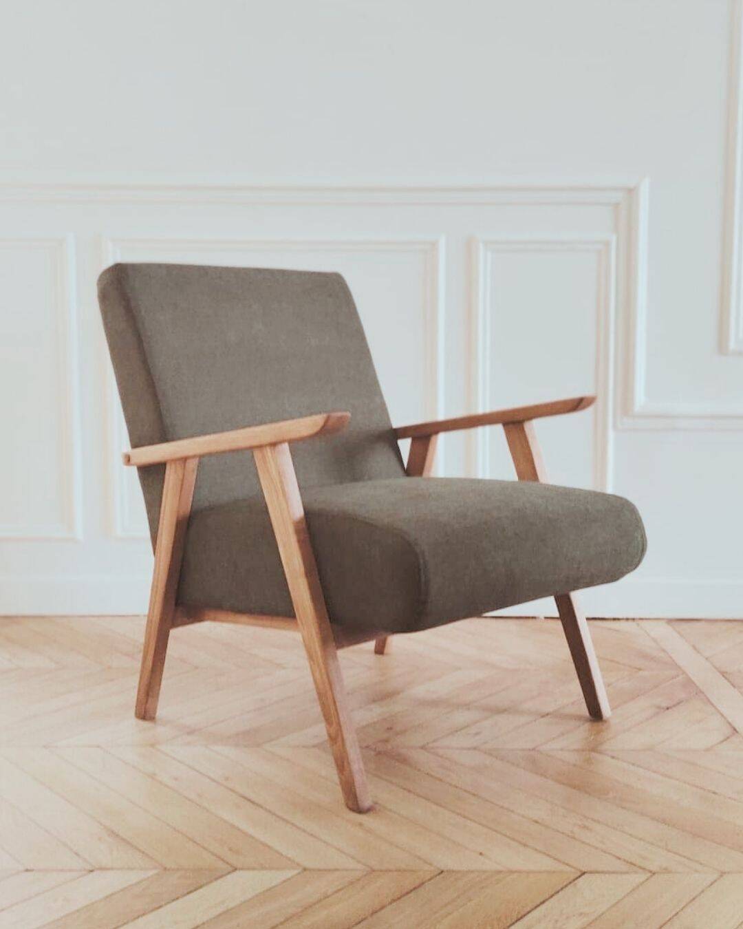Renovated armchair, Scandinavian style in wood and green fabric.