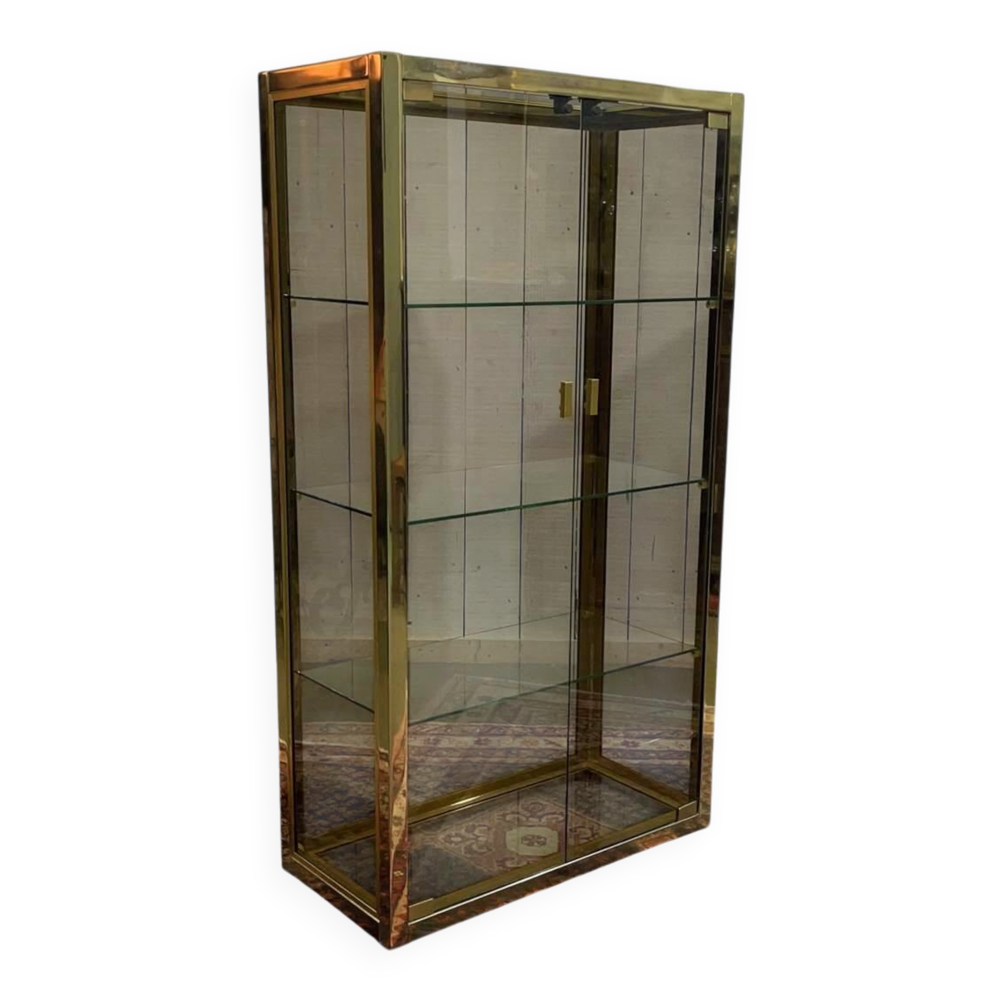 Exhibition showcase in gold-plated chrome and smoked glass - work from the 1980s.