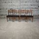 Lot de 4 chaises vintage en skaï