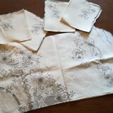 Round off-white tablecloth embroidered with grey flowers with 8 matching napkins - festive table