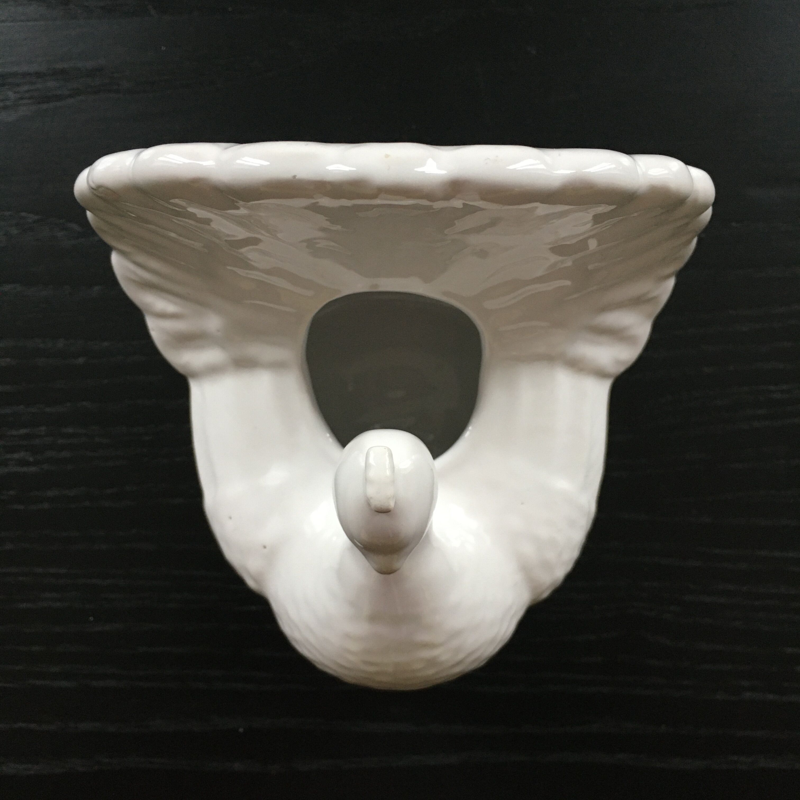 White peacock vase