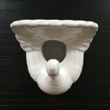 White peacock vase