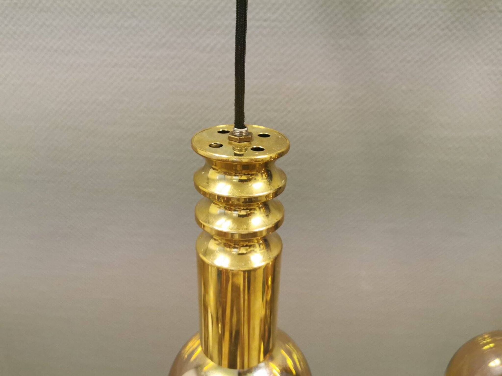 Frimann Goldstar pendant lights made by Philips in the 1970s. Model SPYBALL