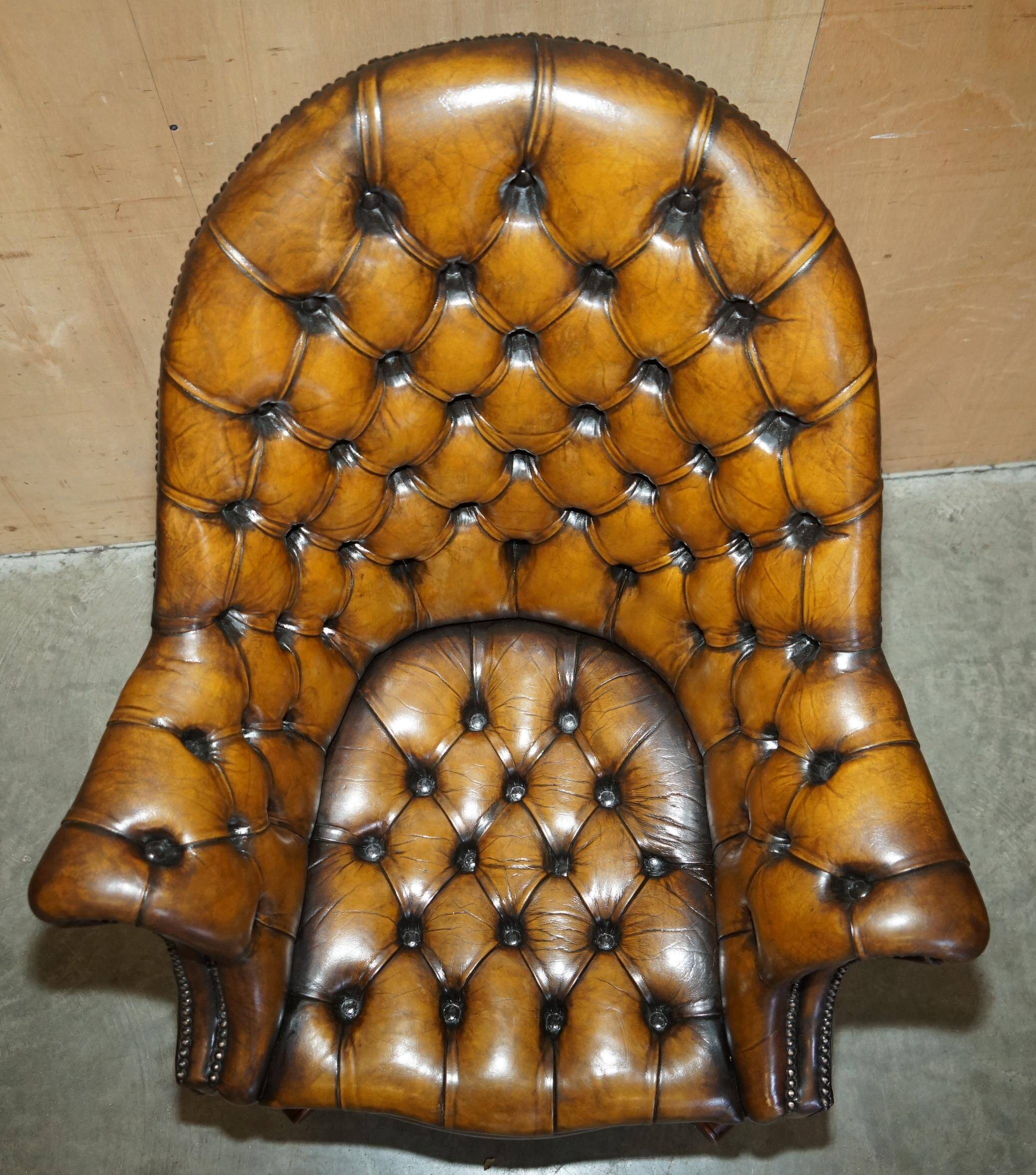 Fauteuil Chesterfield directeur ou capitaine Art Déco en cuir restauré