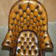 Fauteuil Chesterfield directeur ou capitaine Art Déco en cuir restauré