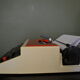 Red and white SVM 315 typewriter