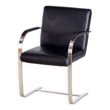 Steel armchair with leather upholstery