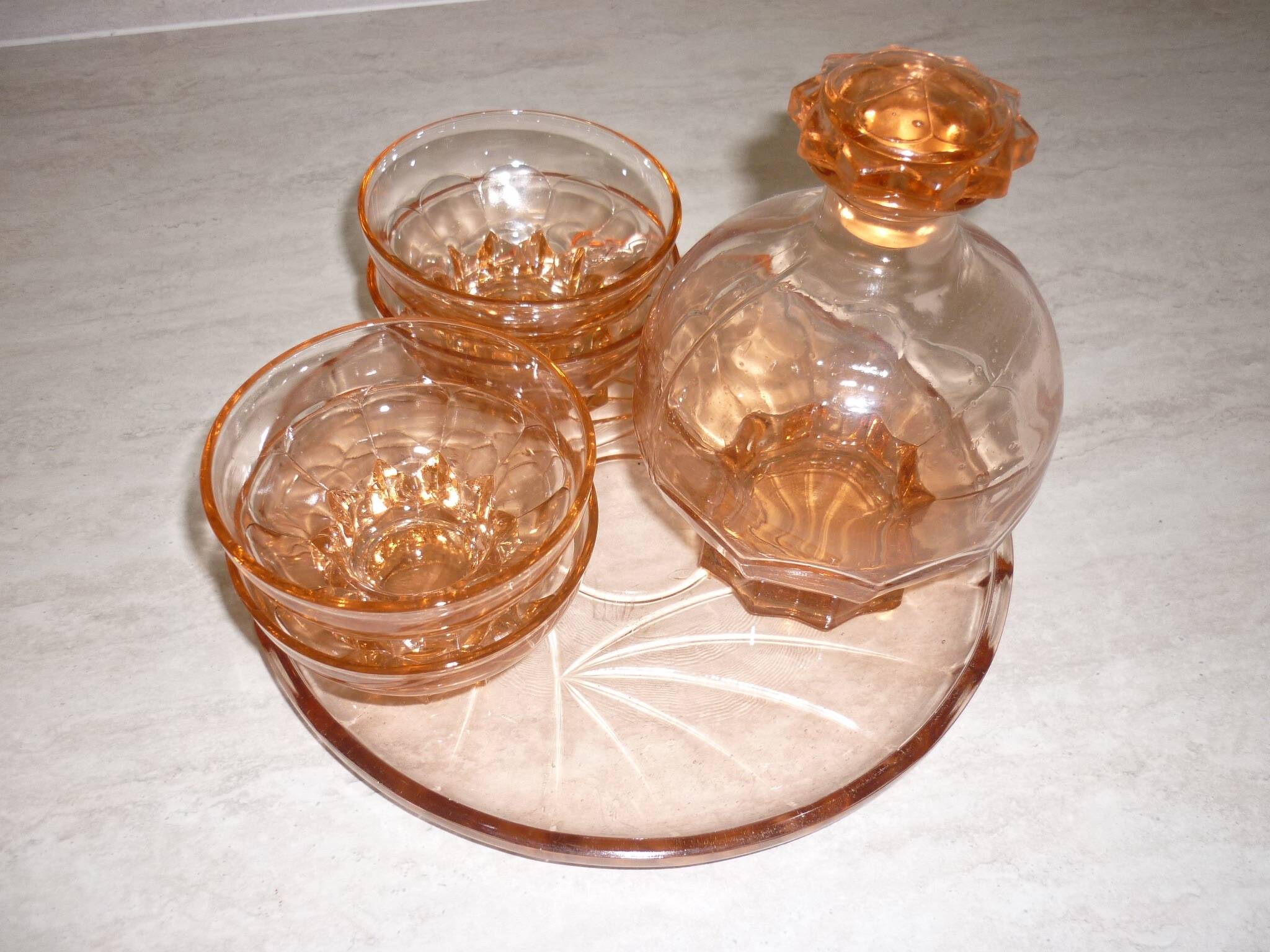 Art deco liqueur service in pink transparent glass with stopper