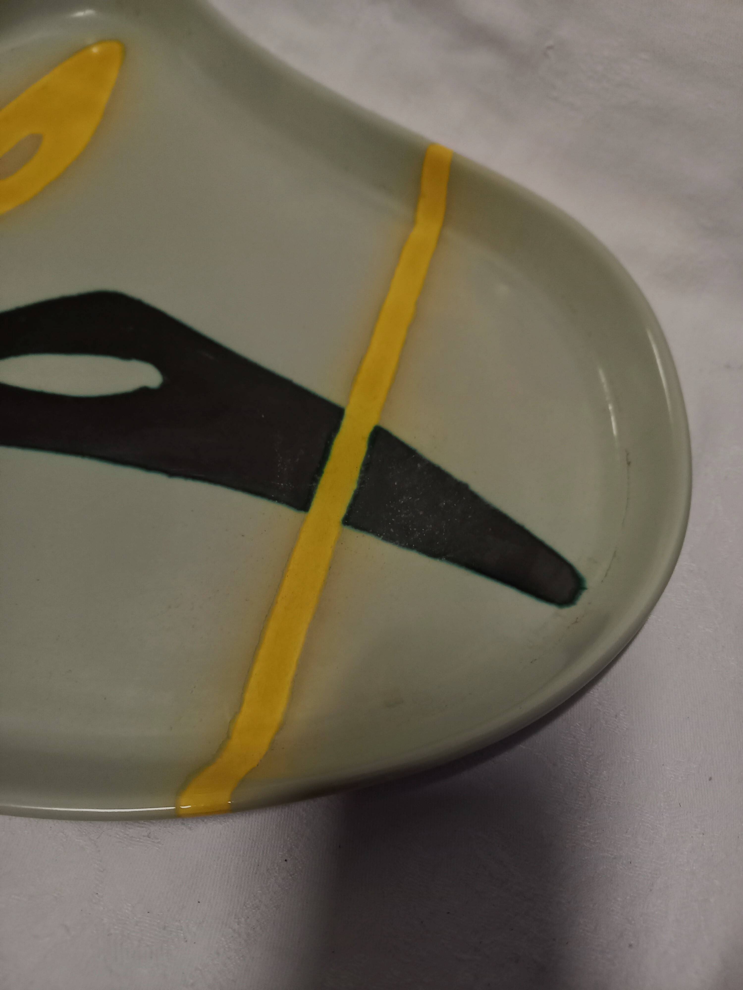 Ceramic dish by Peter Orlando, free form with abstract decoration, 1950s