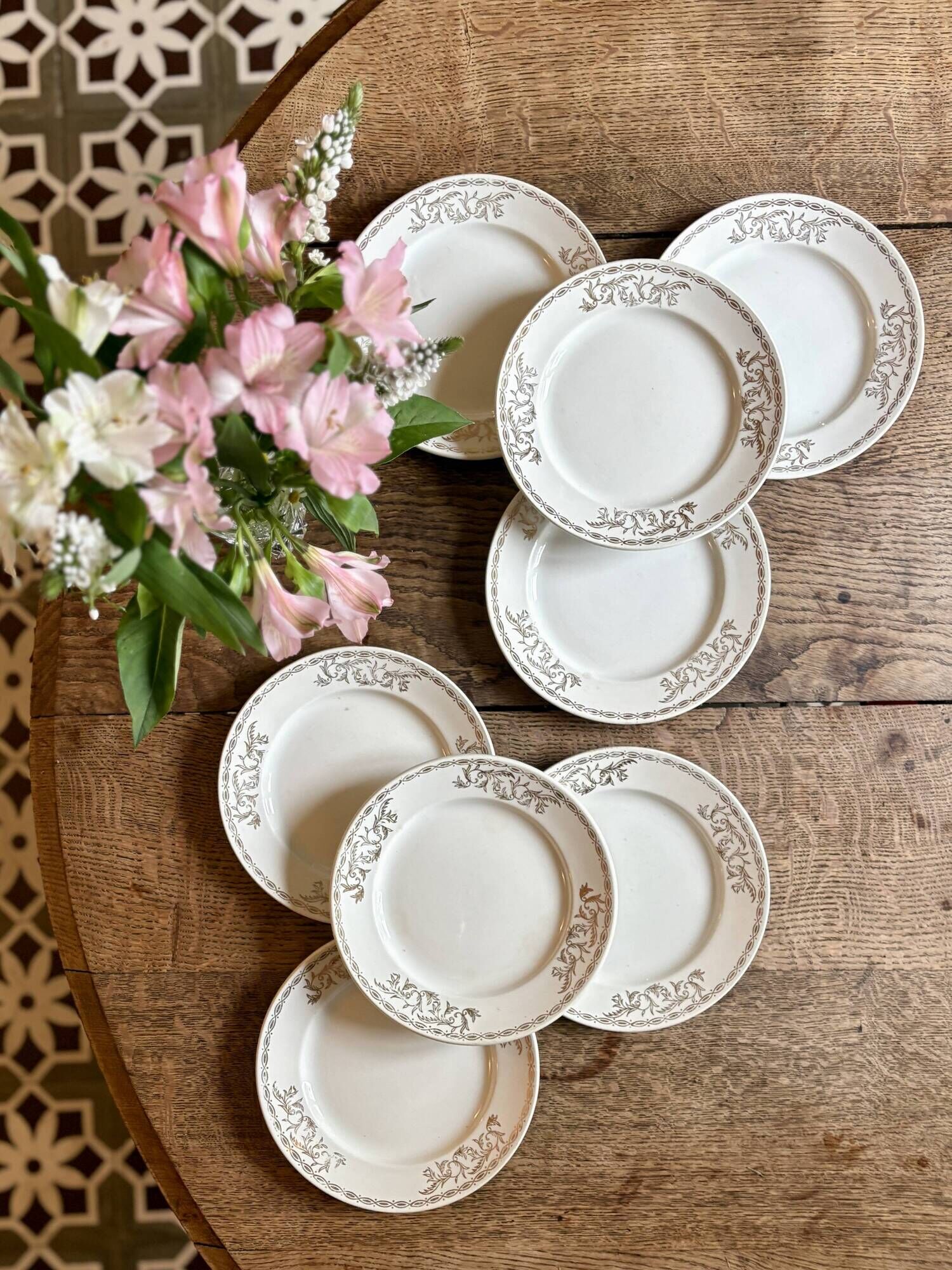 Set of 8 vintage white and gold dessert plates.