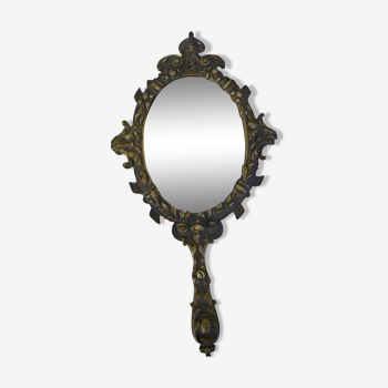 Hand-facing mirror in gilded bronze