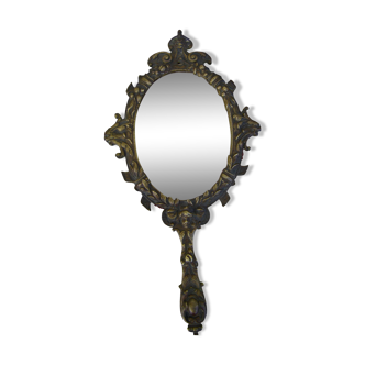 Hand-facing mirror in gilded bronze