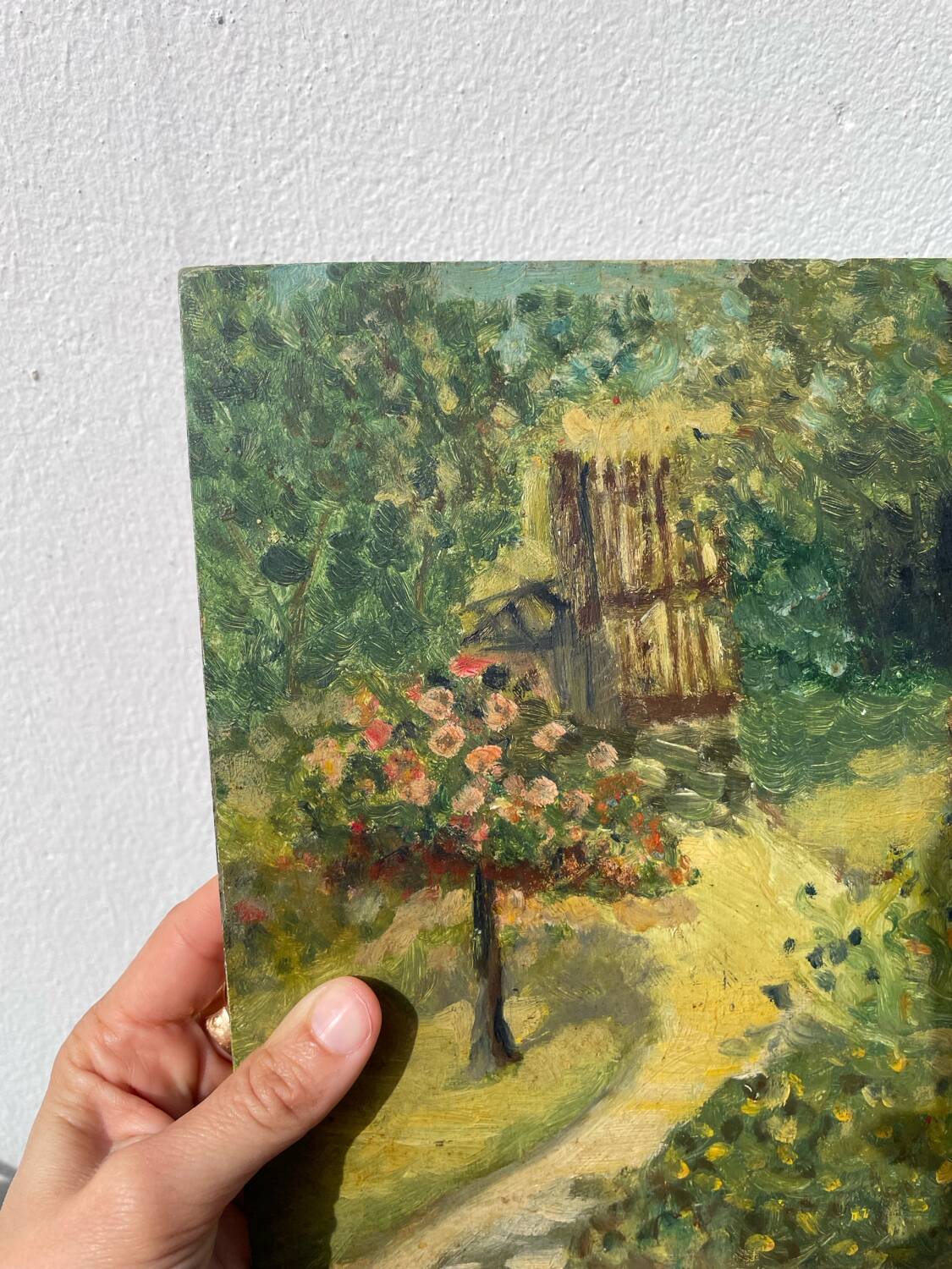 Paysage jardin à l’huile signé