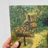 Garden landscape in oil signed
