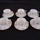 6 tasses à café et sous-tasses en porcelaine fine Art Déco