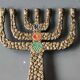 Menorah/Candlestick with 7 light arms. In old gold patinated brass/Decor 12 astrological signs. Engraved Jerusalem. Height 14 cm