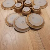 5 Stoneware cups and saucers