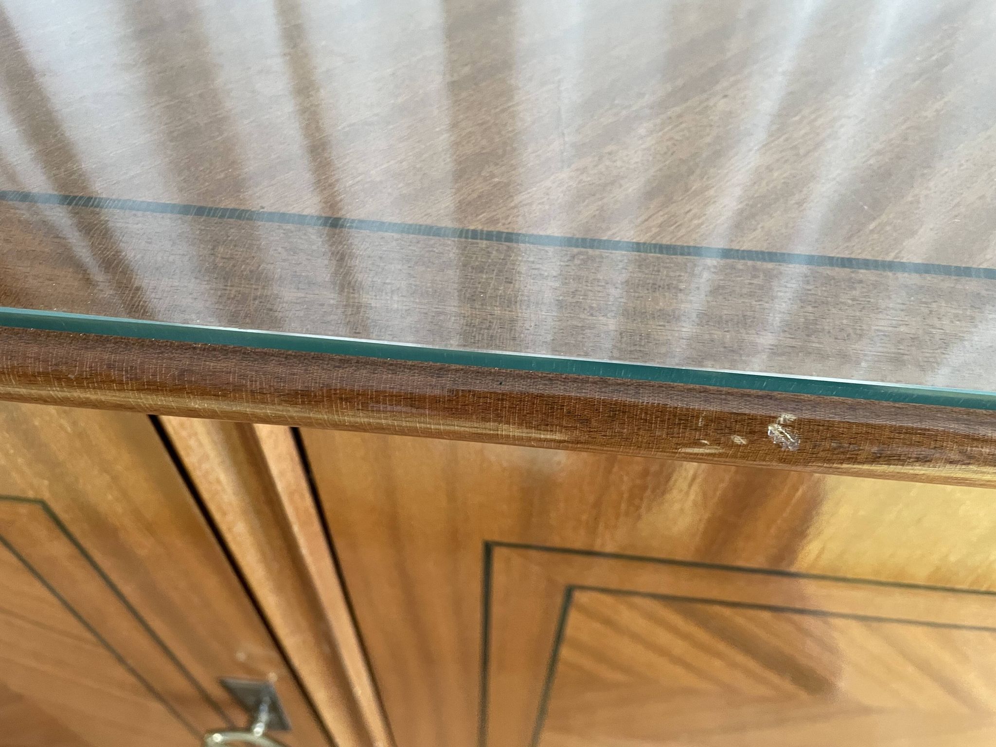 Vintage 4-door sideboard with wood veneer and glass top