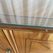 Vintage 4-door sideboard with wood veneer and glass top
