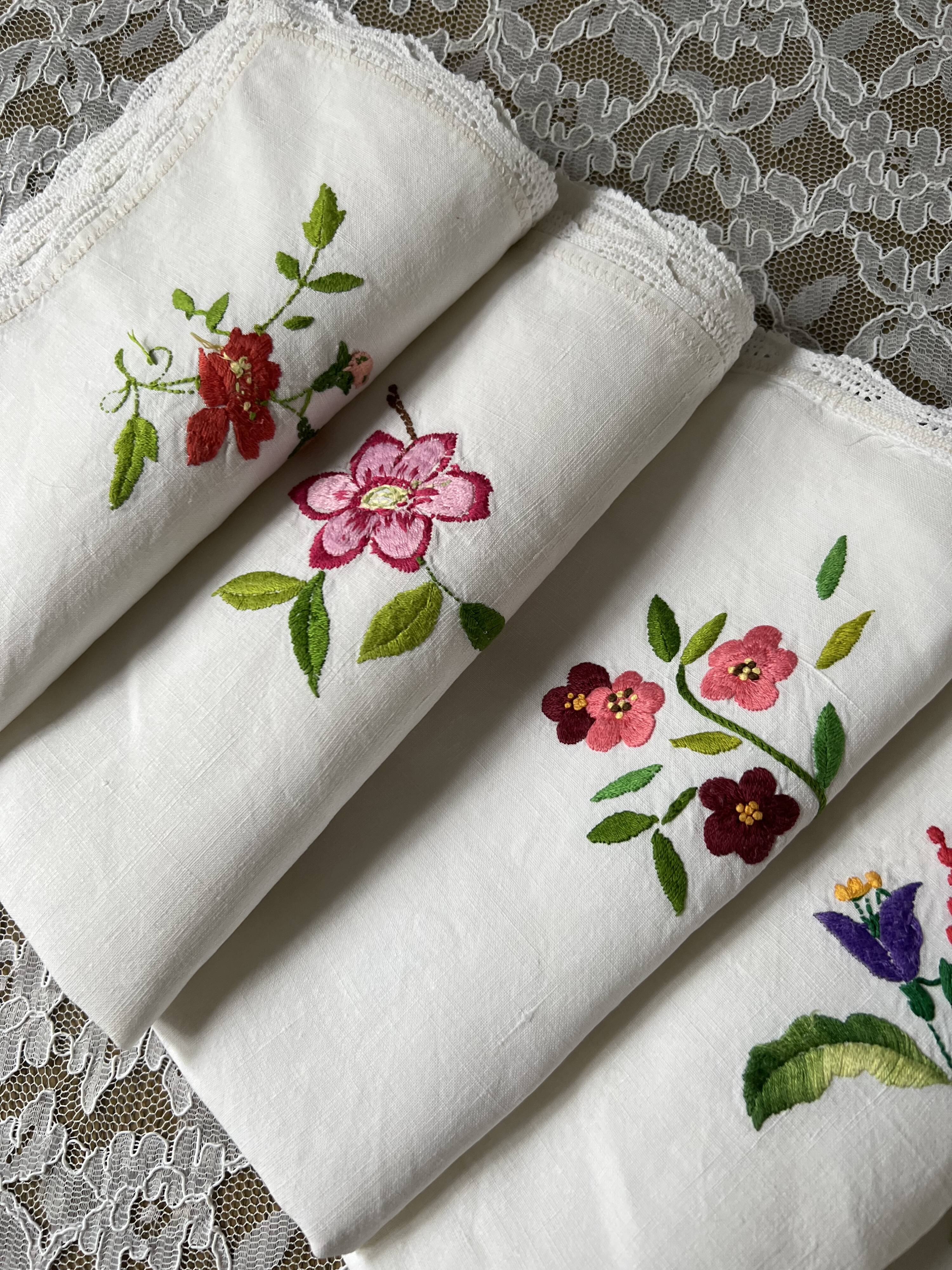 7 antique and embroidered napkins