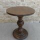 Pedestal table on carved wooden base