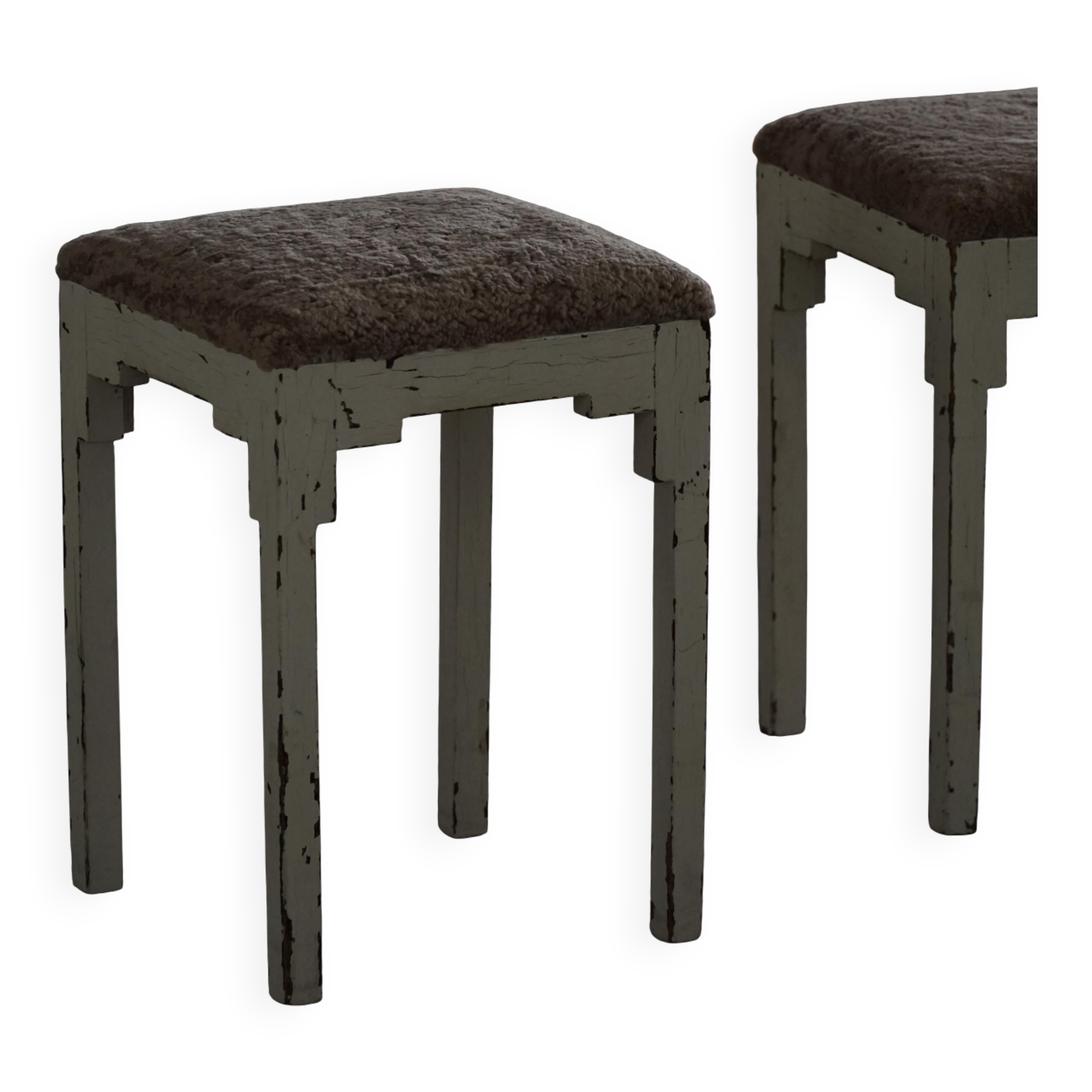 A pair of antique Danish stools, seats in lambswool, late 19th century.
