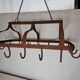 pig holder, wrought iron hook support