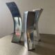 Trio of cast aluminum candle holders