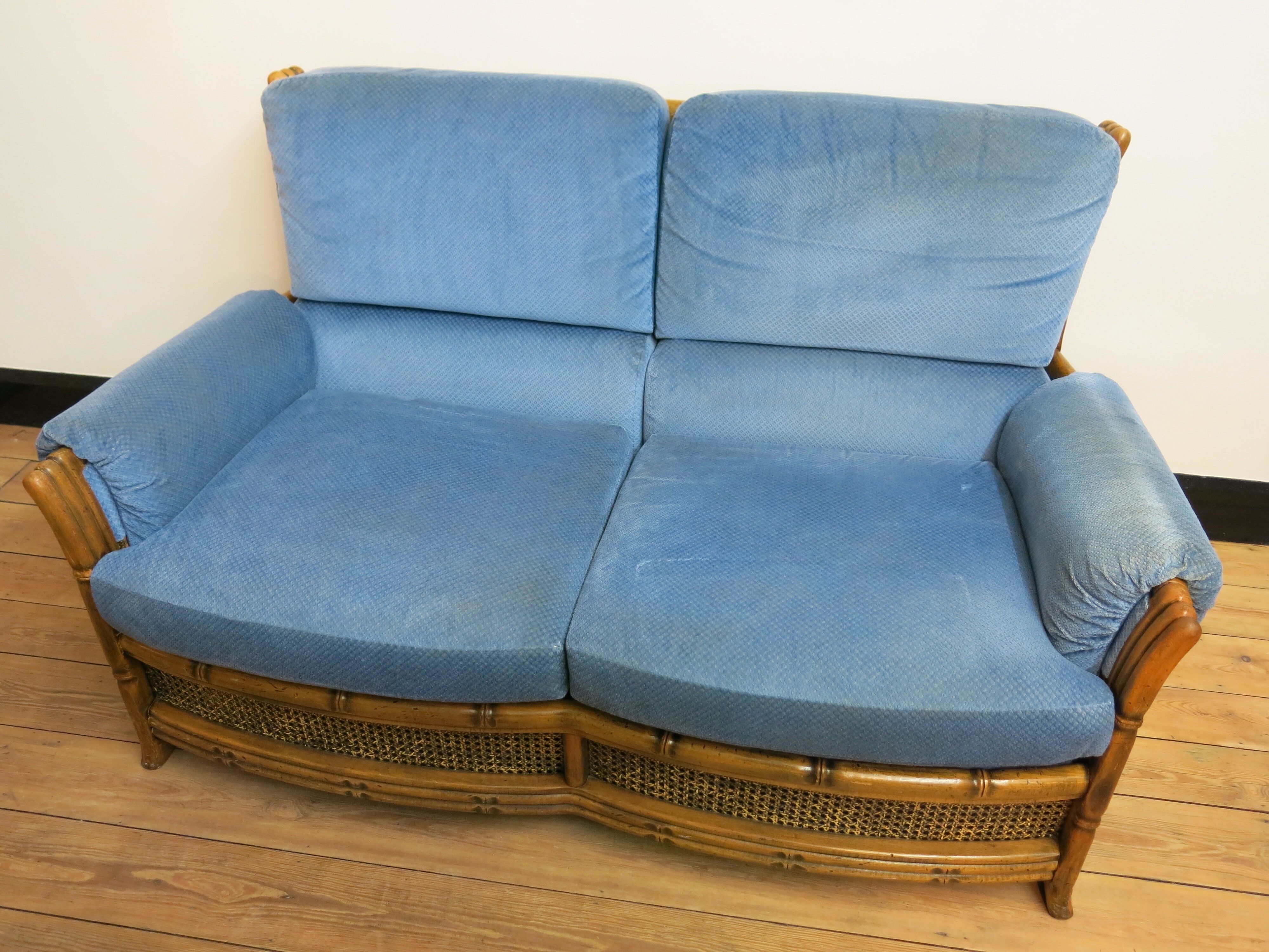 Colonial sofa two places in cannage and carved wood