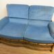 Colonial sofa two places in cannage and carved wood