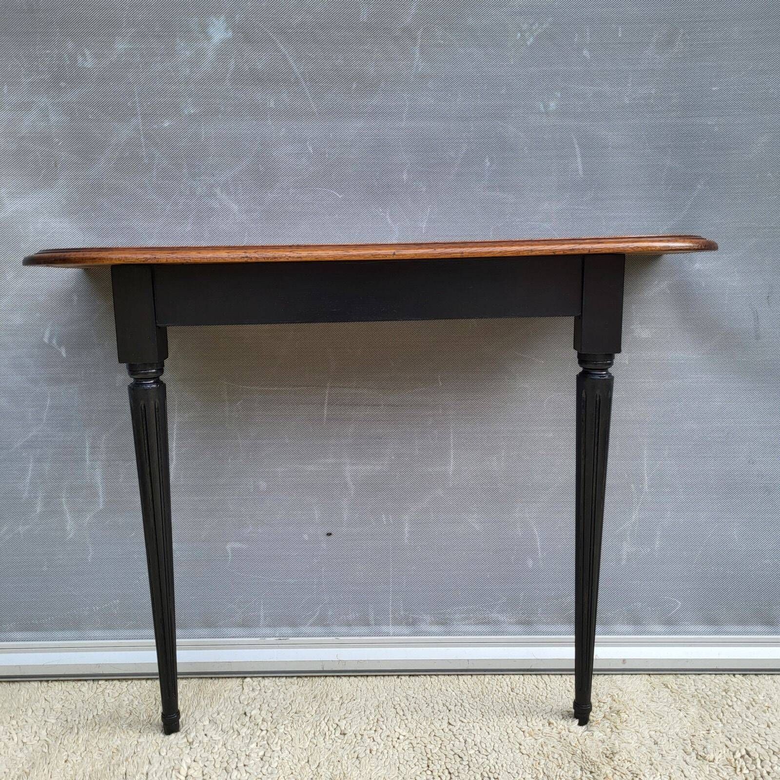 Console bicolore noire et chêne style Louis XVI restaurée