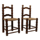 Pair of rustic chairs in turned wood with straw seats
