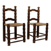 Paire de chaises rustiques en bois tourné et assise en paillage