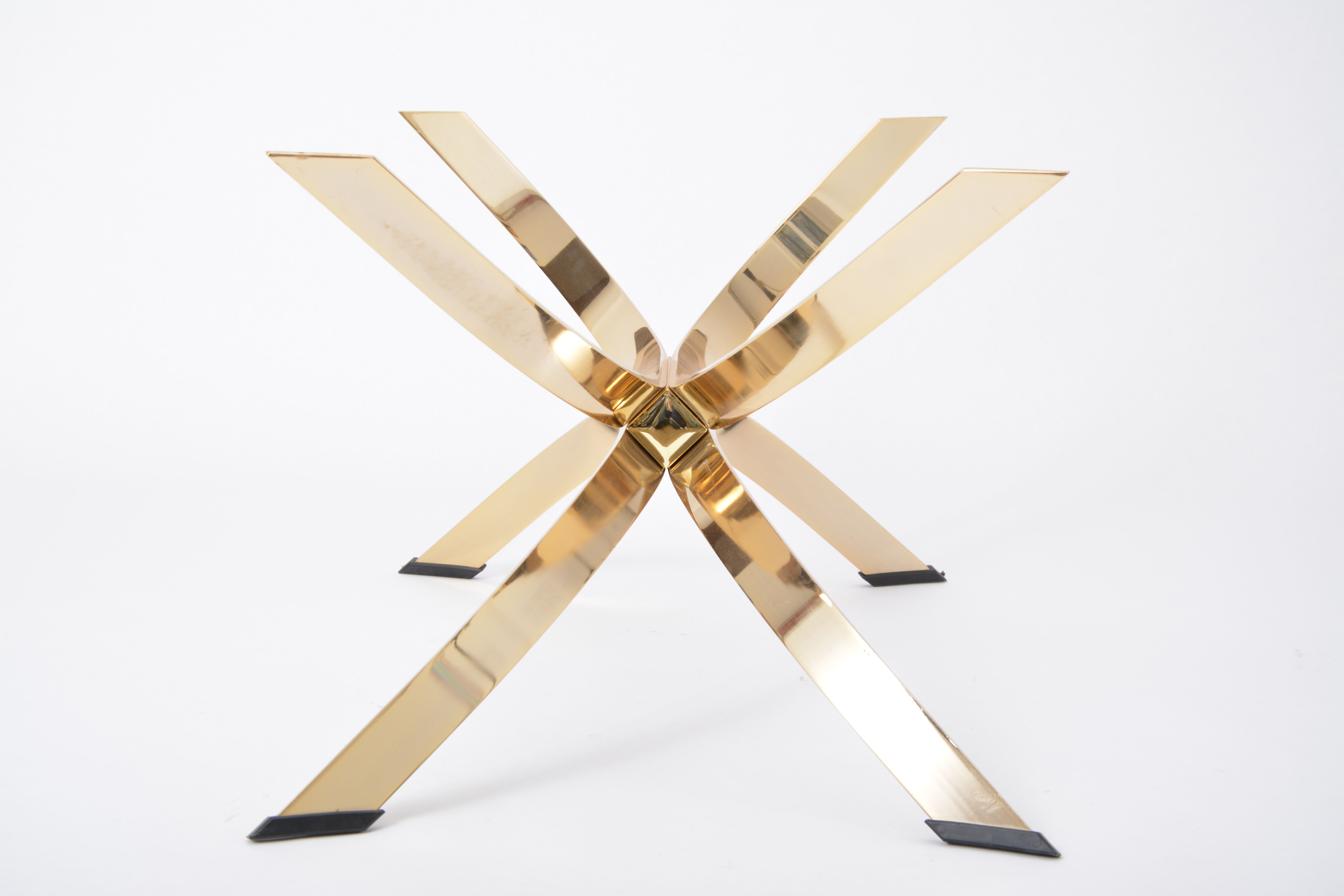 Gold Colored Mid-Century Modern coffee table with smoked Glass top