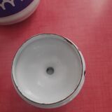 White enamelled sheet metal coffee maker with embossed blue patterns