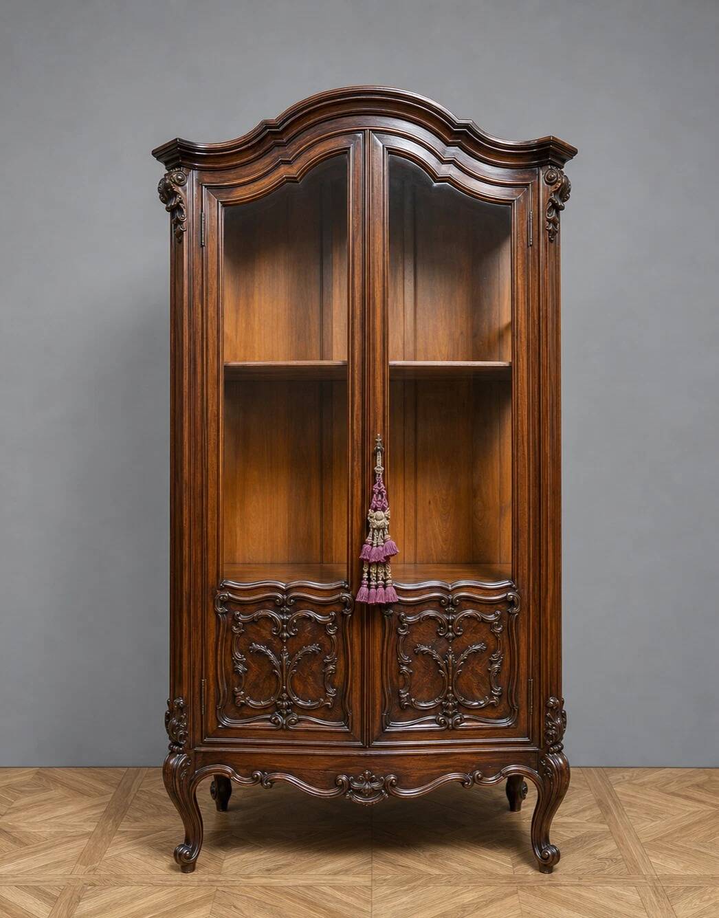 Curved library with two walnut doors, in Louis XV style.