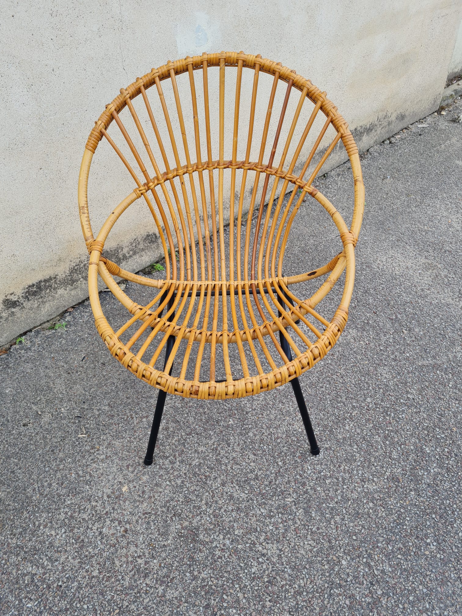 Vintage rattan shell armchair from the 60s