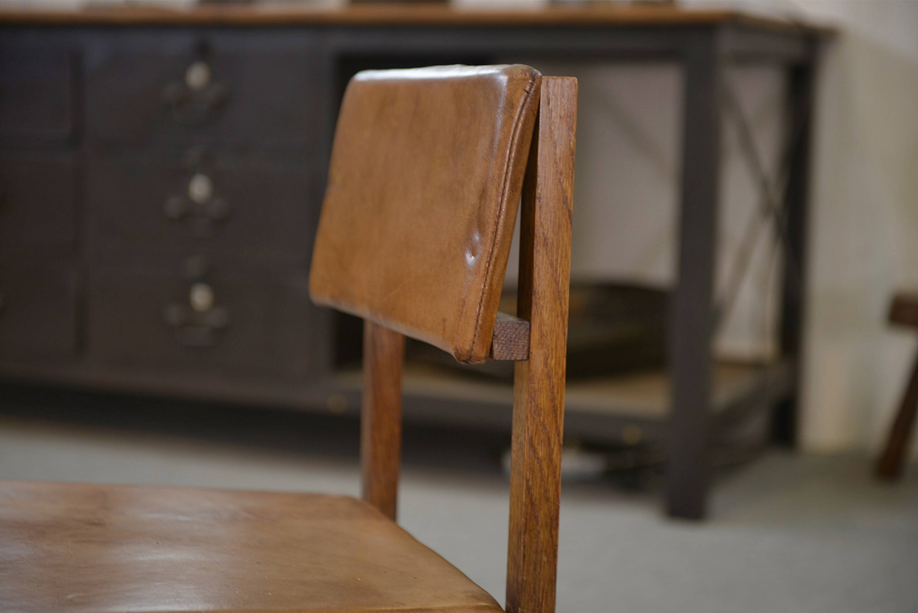 Pair of oak and leather chairs in the style of Gerrit Rietveld 1960s.