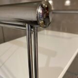 Modular wall bookshelf desk in vintage chrome.