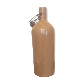 Enamelled sandstone bottle - 70s