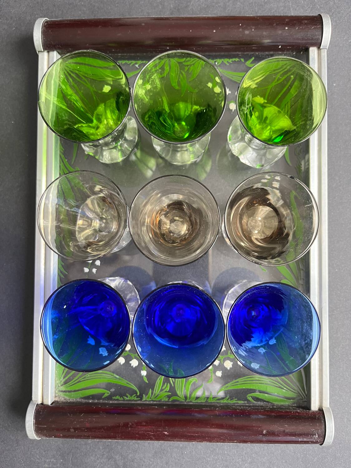 Service of 9 colored liqueur glasses