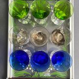 Service of 9 colored liqueur glasses