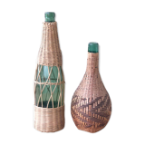 Two vintage bottles with wicker