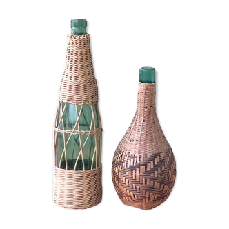 Two vintage bottles with wicker